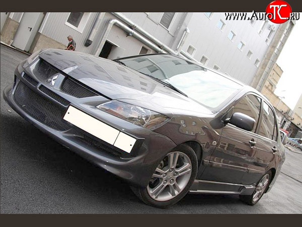 16 099 р. Передний бампер Evo Mitsubishi Lancer 9 CS седан 1-ый рестайлинг (2003-2005) (Без сетки, Неокрашенный)  с доставкой в г. Чебоксары