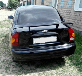 3 099 р. Низкий универсальный спойлер Кураж KIA Optima 1 GD седан (2000-2005) (Без места под стоп сигнал, Неокрашенный)  с доставкой в г. Чебоксары. Увеличить фотографию 16