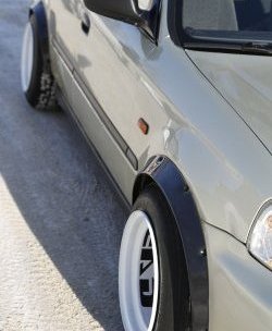 4 739 р. Универсальные фендера на колёсные арки RA (вынос 50 мм, комплект) Suzuki Aerio RA21S, RC51S седан дорестайлинг (2001-2003) (Поверхность глянец (под окраску))  с доставкой в г. Чебоксары. Увеличить фотографию 7